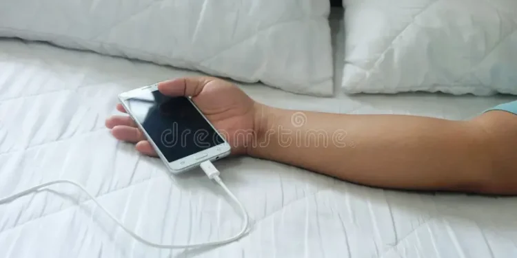 Charging phone on bed while asleep may cause fire outbreak, says expert