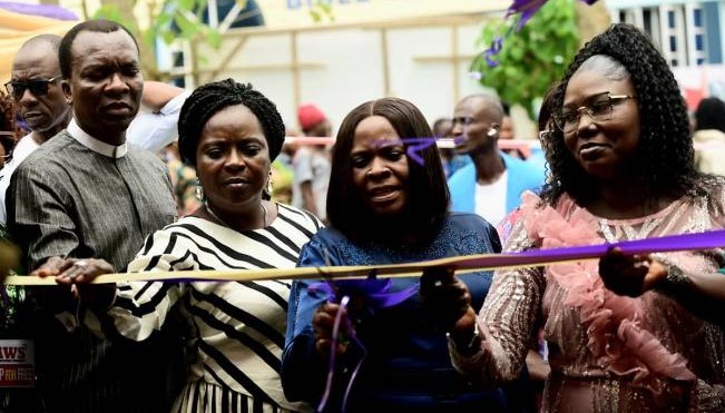 Hundreds storm church to benefit from late Fola Achudume’s legacy of compassion